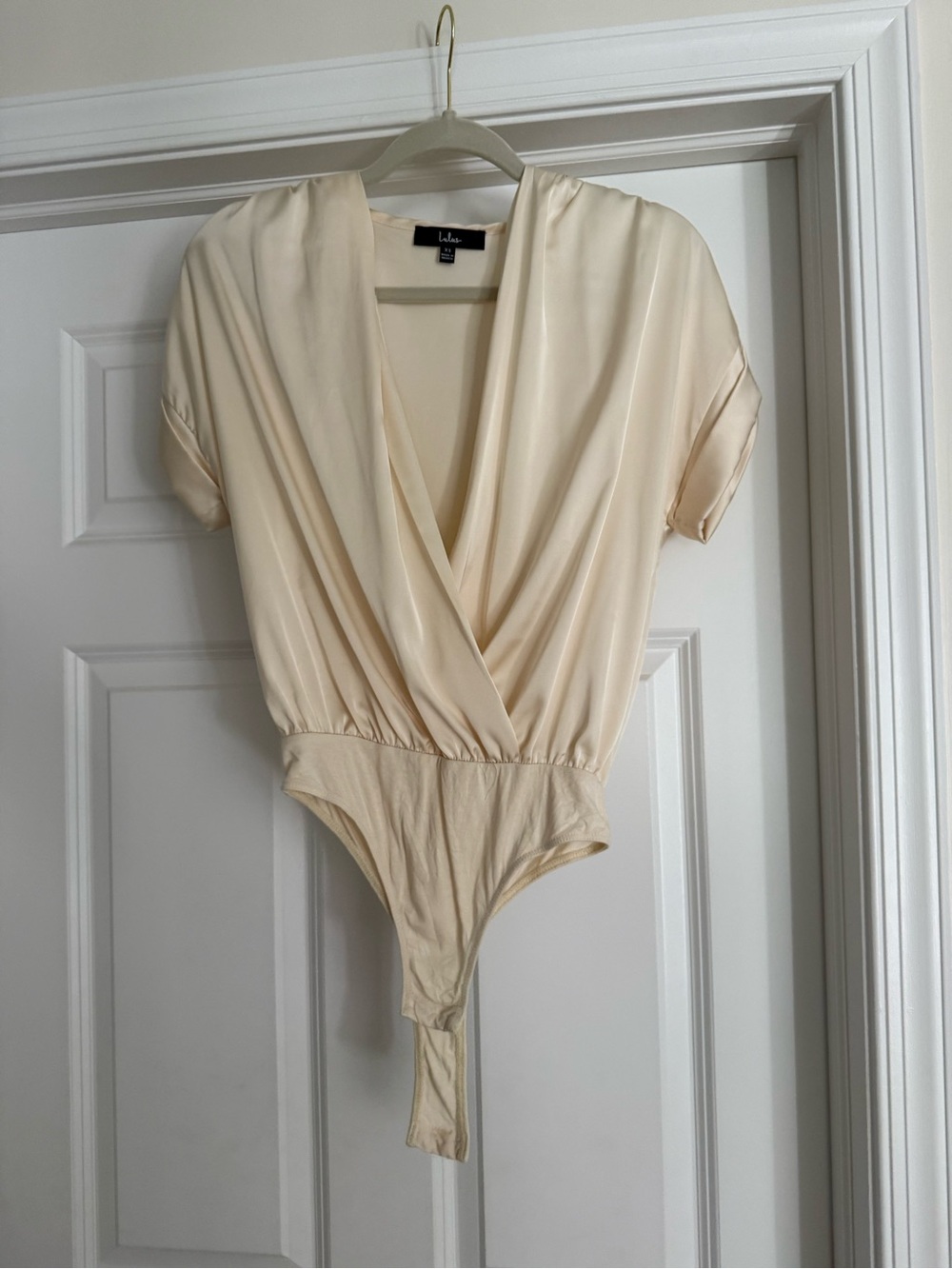 Lulu's Cream Draped Surplice Bodysuit